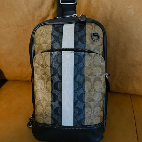 Coach Men’s Signature Canvas Crossbody Sling Backpack – Stripe Detail - Picture 1 of 3